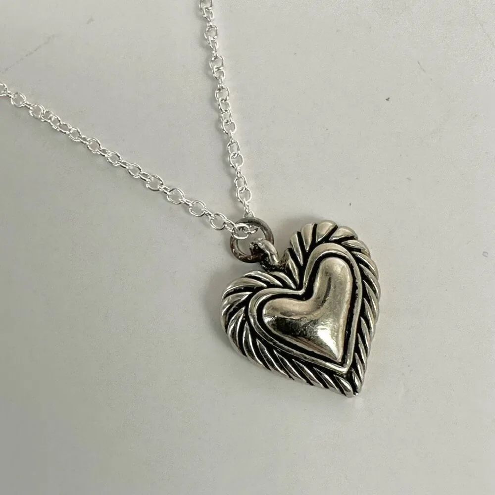 Silver tone heart pendant necklace